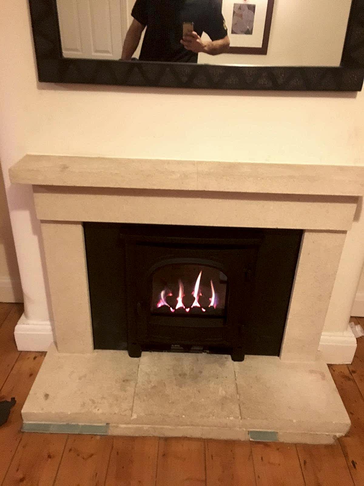 Close-up of a modern fireplace installed by AD Plumbing, Heating, and Electrical.