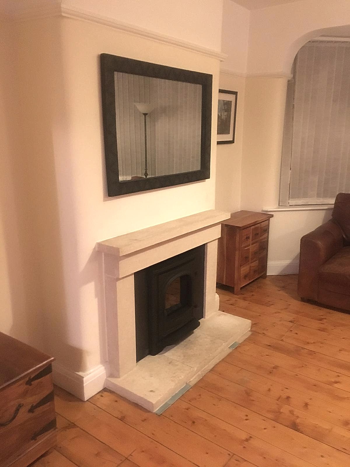 Modern fireplace installation showcasing craftsmanship by AD Plumbing, Heating, and Electrical.