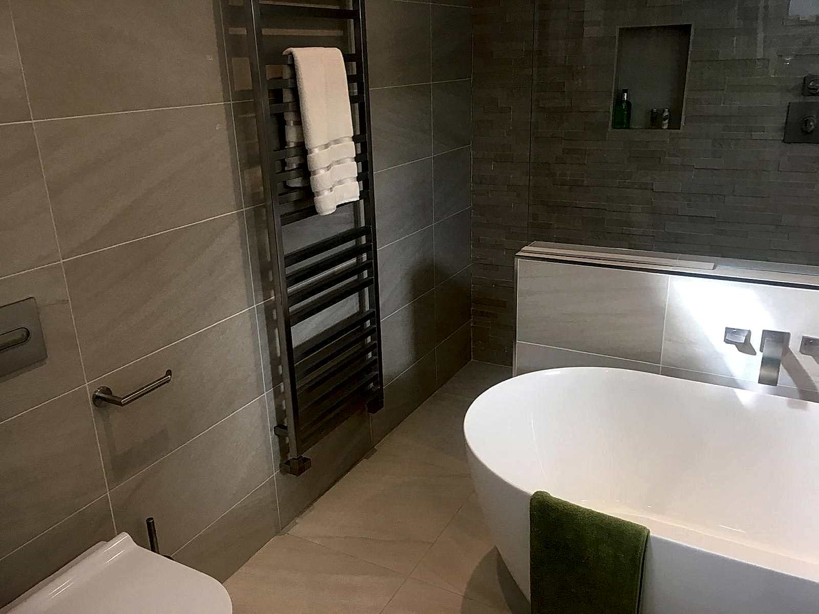 Completed bathroom fitting by AD Plumbing, Heating, and Electrical.