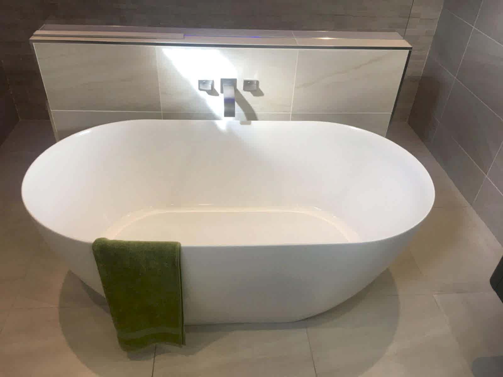Modern Bathtub Installation Close-up of a modern bathtub installed by AD Plumbing, Heating, and Electrical.