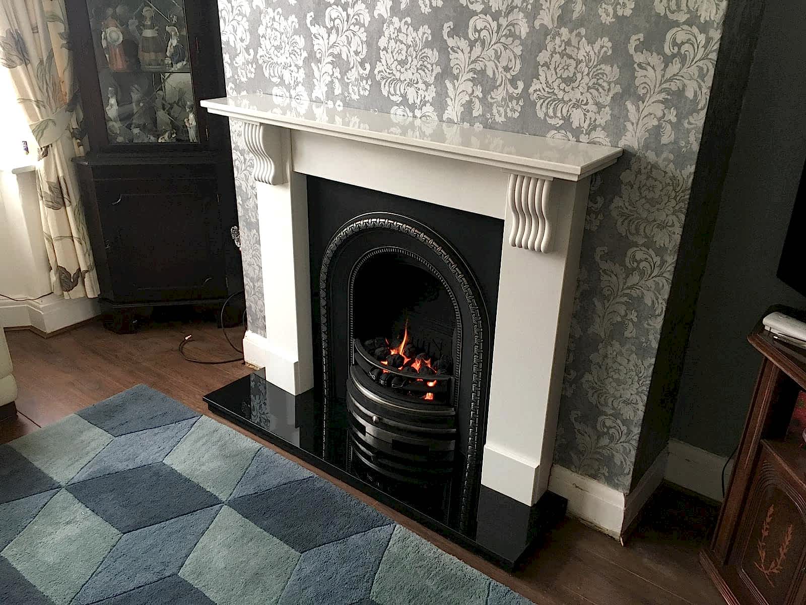 Modern fireplace installation by AD Plumbing, Heating, and Electrical.